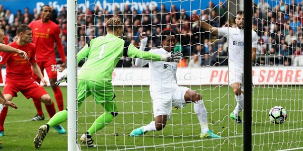 Swansea 1-2: Liverpool: Milner penalty continues Reds’ winning run