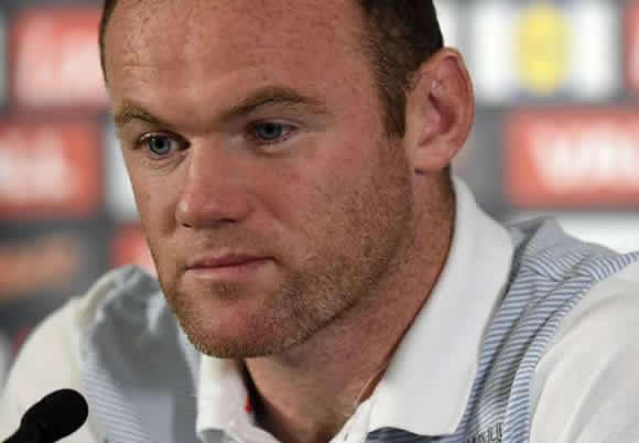 Rooney tired of questions over best position