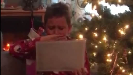 This kid cries happy tears after getting soccer tickets for Christmas and it’s adorable