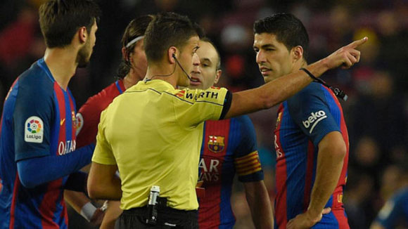 Luis Suarez hit with two-match ban