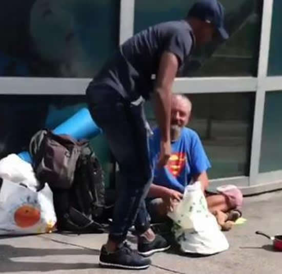 Ex-Manchester United legend Patrice Evra takes time off training to hand out food to the homeless