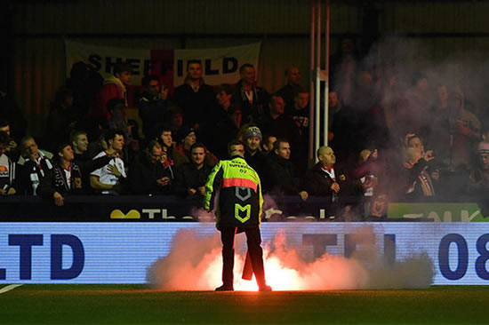 Pitch catches fire after FLARE thrown at FA Cup tie
