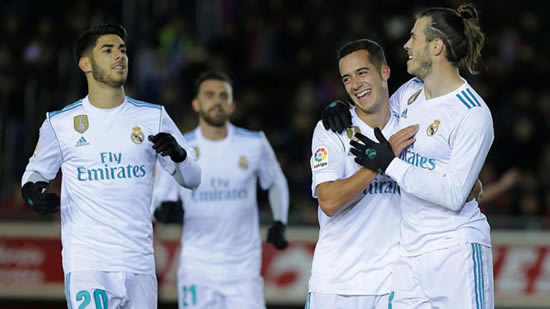 Real Madrid suffer before surging past Numancia