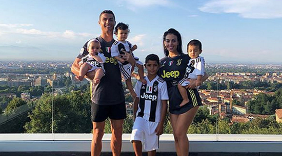Cristiano Ronaldo's family pose in Juventus kits