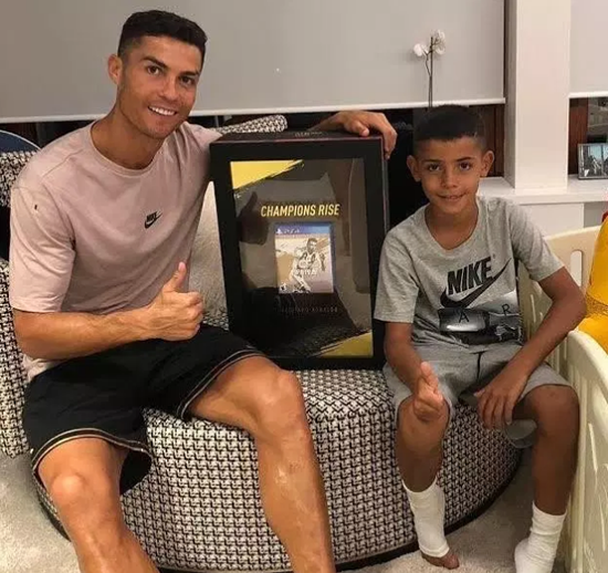 Cristiano Ronaldo proudly shows off world's first copy of Fifa 19 alongside son