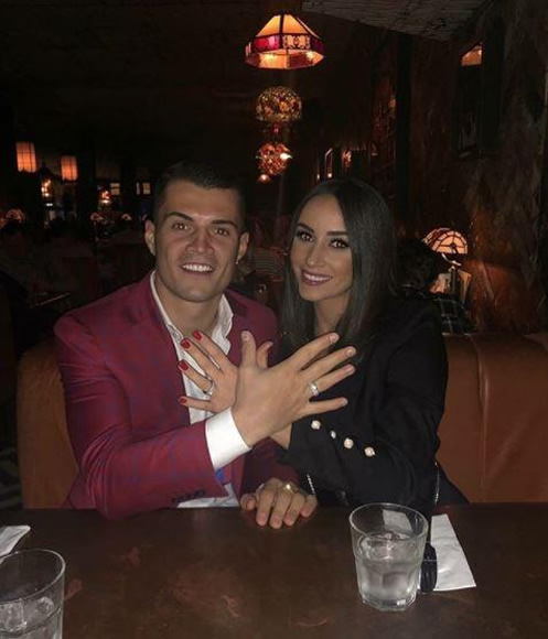 Arsenal star Granit Xhaka and wife Leonita risk furious backlash as they share Albanian Eagle gesture over dinner – here's what it means