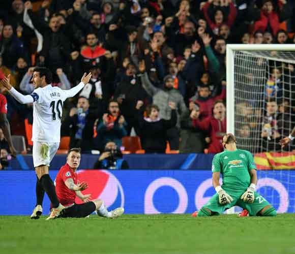 Valencia 2 Manchester United 1: Jones scores own goal as Red Devils limp through