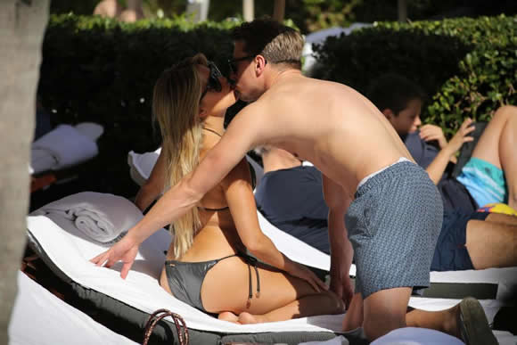 Jamie Redknapp ogles Rafael van der Vaart's ex-wife Sylvie Meis while poolside in Miami