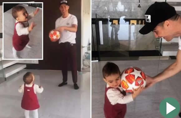 Cristiano Ronaldo's cute baby daughter runs off with his hat-trick ball