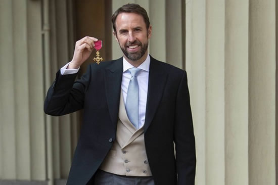 England boss Gareth Southgate wears waistcoat AGAIN as he collects OBE from Prince Charles
