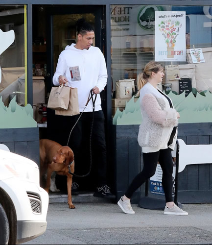 Man Utd star Smalling and pregnant wife Sam Cooke buy treats for dogs Ruben and Miley