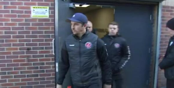 Police physically stop Joey Barton leaving ground after he is accused of assaulting Barnsley manager in post-match brawl