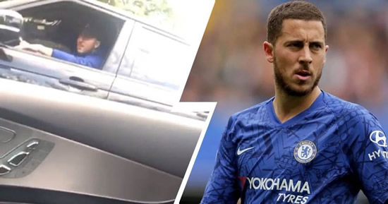 Hazard shakes his head when asked if he'll stay at Chelsea