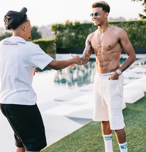 Dele Alli chats to mystery woman after being driven around LA in convoy of supercars as Spurs ace enjoys well-deserved break