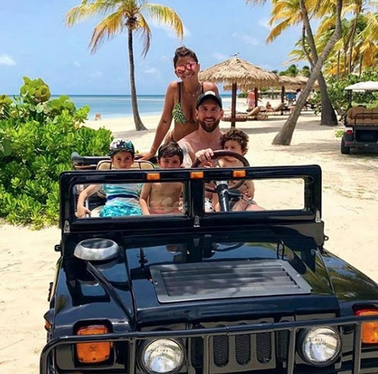 Lionel Messi poses with wife and kids on holiday as he puts Argentina misery behind him