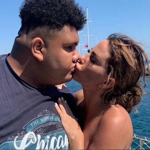 Katie Price divides fans after kissing 17-year-old son Harvey on the lips