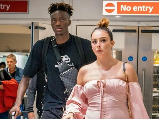 TAM OFF Tammy Abraham gets over England snub by jetting to Barcelona with girlfriend… and posing for a selfie with a fan
