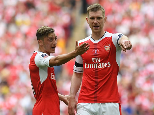 Per Mertesacker admits Arsenal pal Mesut Ozil 'p***ed him off'