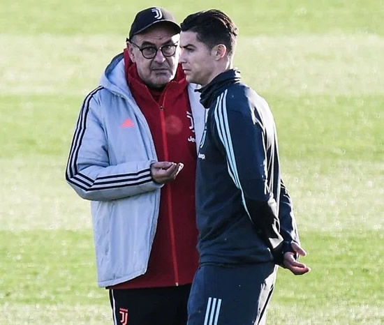Cristiano Ronaldo looks stony-faced as he talks with Juventus boss Sarri in training after injury 'row'