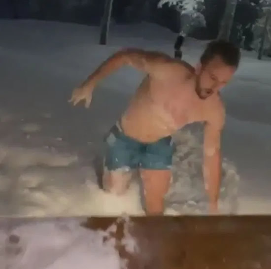 Spurs star Harry Kane dive face first into a snow drift wearing only his shorts on trip to Santa's home in Finland