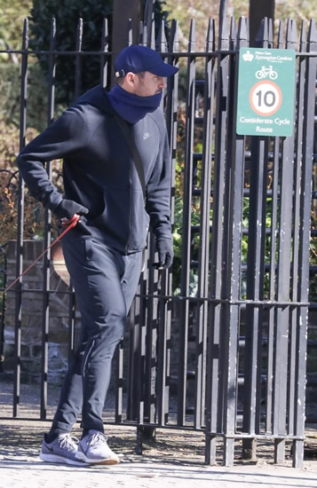 Chelsea boss Frank Lampard covers face with scarf and wears gloves to walk dog Minnie amid coronavirus fears