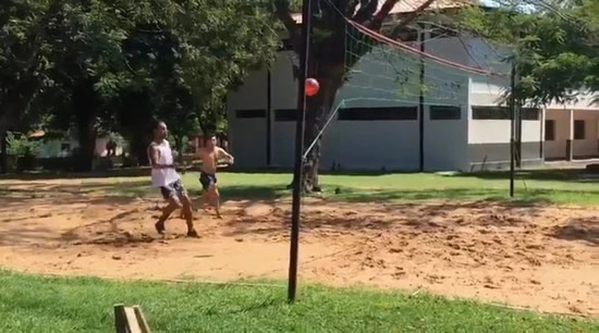 Ronaldinho plays footvolley with ease in prison as Brazil and Barcelona legend proves his touch is as good as ever