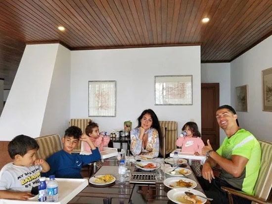 CR-HEAVEN Cristiano Ronaldo posts cute family snap with Georgina and kids making food and Jr watching video games during lockdown