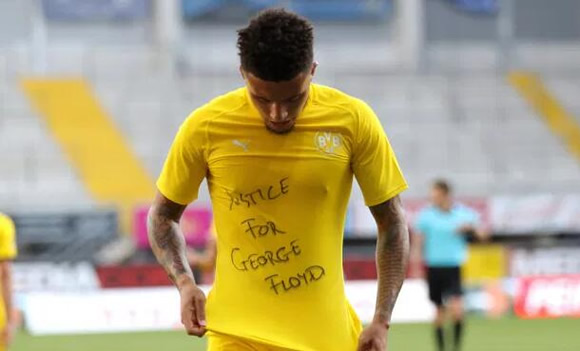 Jadon Sancho and Borussia Dortmund team-mates wear anti-racism T-shirts and take a knee on day of worldwide protests