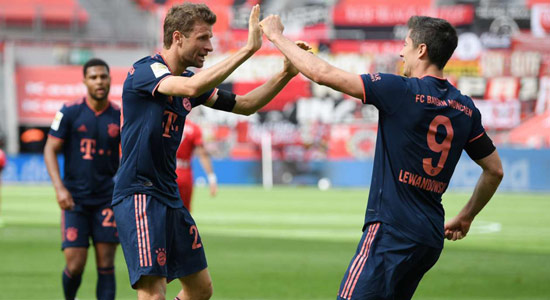Bayer Leverkusen 2-4 Bayern Munich: Lewandowski and Muller reach milestones in resounding win