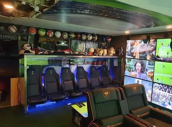 Football Fan Transforms His Garage Into $35,000 Mancave With 14 Screens