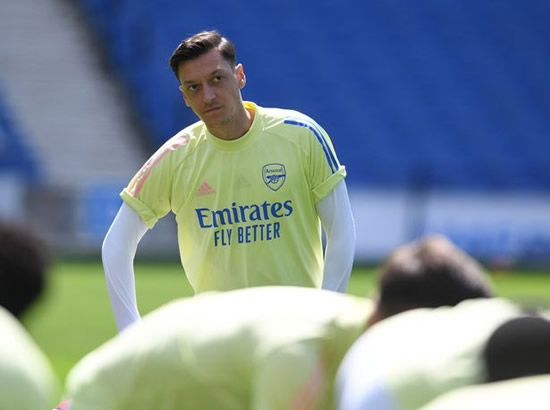 Mesut Ozil 'snubs' Arsenal exit - but could still have transfer get-out option this summer