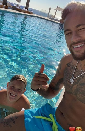 Neymar dyes half his hair blonde as he reveals wacky new style during Ibiza getaway with his son