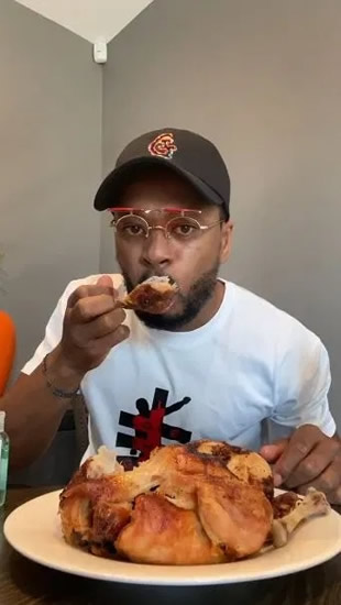 PROFESSIONAL FOWL Watch Patrice Evra eat cooked chicken in bizarre ‘upgrade’ to infamous video of Man Utd legend licking RAW meat