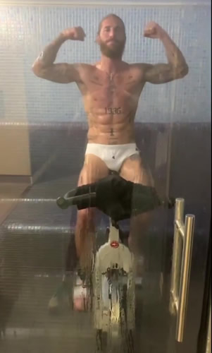 Watch ripped Sergio Ramos crush weights and hit spin bike in just his pants in mad training session days after injury