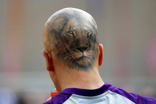 Keeper gets incredible lion tattoo on his head after hair fell out following coronavirus battle