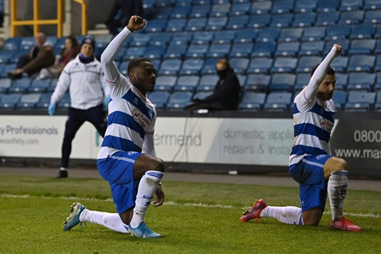 QPR players celebrate goal against Millwall by taking knee in front of home fans