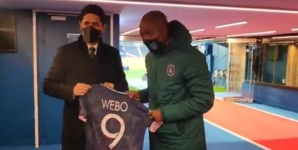 WE ARE TOGETHER Pierre Webo handed a special jersey by PSG president following delayed game in wake of official race row