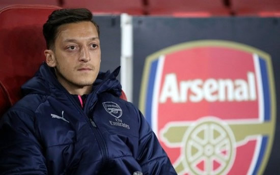 Done deal: Arsenal favourite Mesut Ozil officially completes his transfer to Turkish giants Fenerbahce