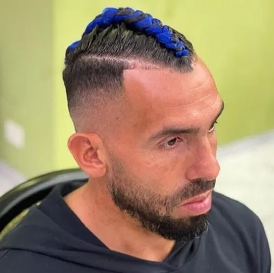 Carlos Tevez shows off daring new haircut with blue braided mohawk in dramatic new look from old long locks