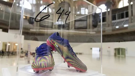 Lionel Messi's record breaking boots go up for auction