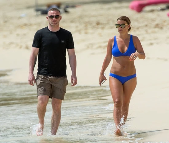RAIN ROONEY Wayne and Coleen Rooney plan seaside summer holiday with their kids in wet and windy Wales
