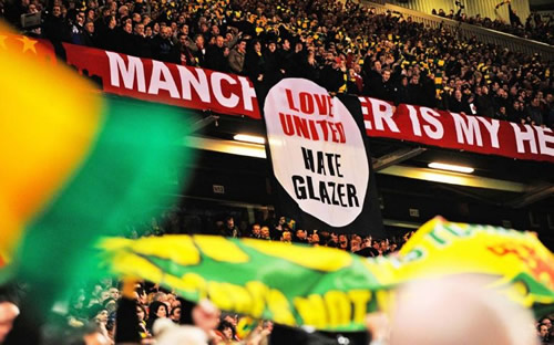 Manchester United fan protests cost club massive £200m sponsorship deal as company frets over anger towards Glazers
