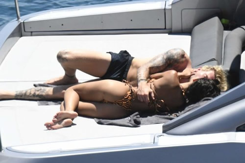 Liverpool's Loris Karius apologises after being caught kissing mystery woman on yacht