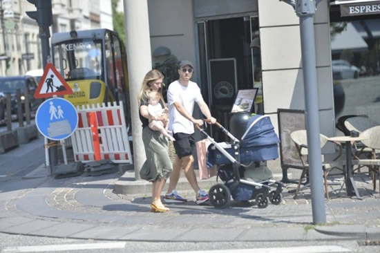 Christian Eriksen takes a stroll with girlfriend and daughter as he enjoys some family time after hospital release