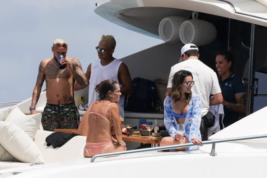Neymar hugs ex Carol Dantas on boat in Ibiza as PSG star soaks up sun with pals and bikini-clad women after Copa America