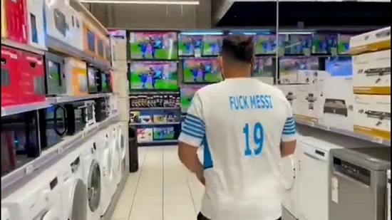 Marseille fan wearing an anti-Messi shirt vandalises electronics store