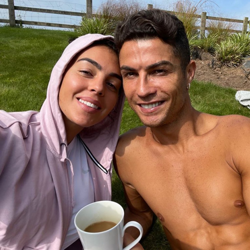 Topless Cristiano Ronaldo sunbathes in Manchester as Georgina reveals she has missed living in UK after Man Utd transfer