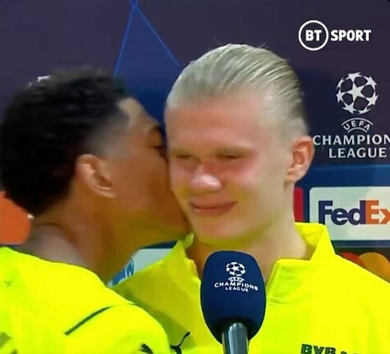 Jude Bellingham plants kiss on Erling Haaland after hijacking Dortmund ace's interview