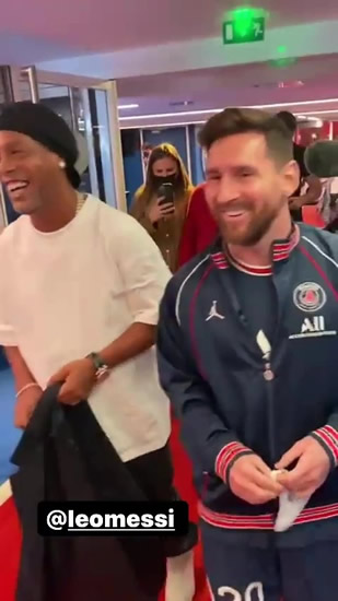 Lionel Messi meets up with close pal Ronaldinho in Paris as PSG ace embraces ex-Barcelona team-mate while joking around