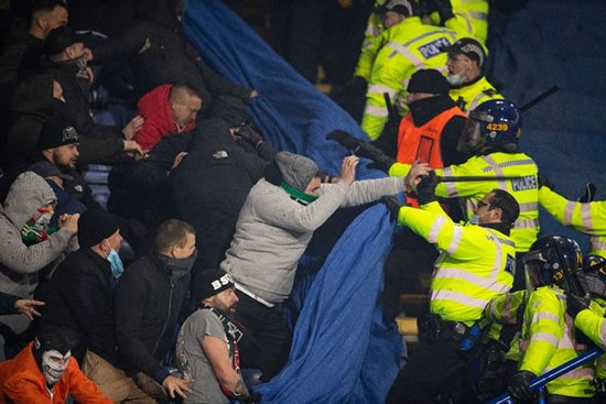 Legia Warsaw thugs punch police and target Leicester fans in violent scenes